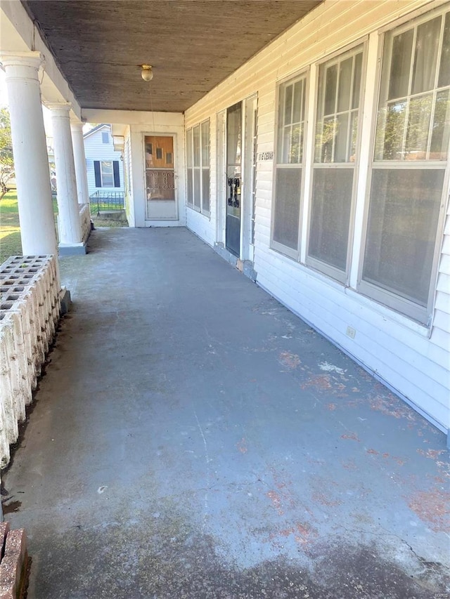 101 E Cedar St, Bertrand, MO 63823 - view of patio with a porch and a carport