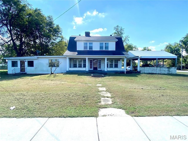 101 E Cedar St, Bertrand, MO 63823 - view of front of property with a porch, a front lawn, and a chimney