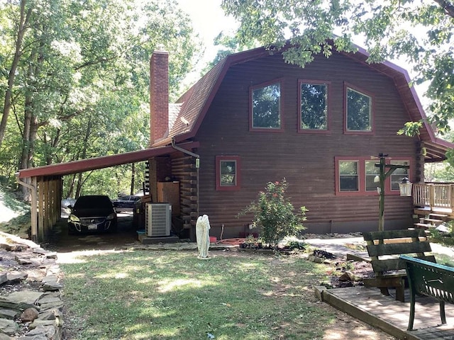 1102 County Road 5, Rockwood, IL 62280 - view of side of property with central AC unit, a gambrel roof, a chimney, and log siding