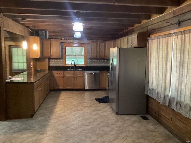 1102 County Road 5, Rockwood, IL 62280 - kitchen featuring stainless steel appliances, a sink, dark countertops, backsplash, and pendant lighting