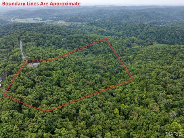 18305 Joerling Ln, Marthasville, MO 63357 - aerial view of property's location featuring a heavily wooded area and property parcel outlined