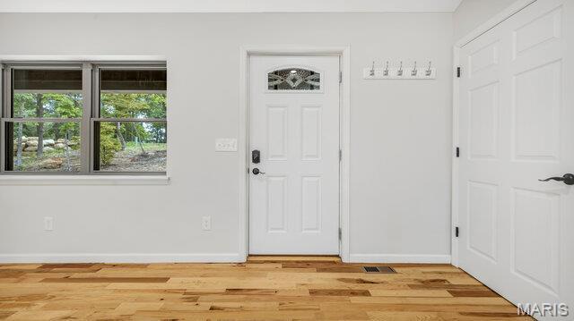 18305 Joerling Ln, Marthasville, MO 63357 - entrance foyer with baseboards and light wood-type flooring