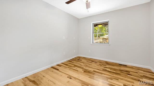 18305 Joerling Ln, Marthasville, MO 63357 - unfurnished room with baseboards, light wood-type flooring, and a ceiling fan