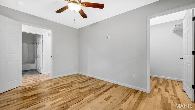 18305 Joerling Ln, Marthasville, MO 63357 - unfurnished bedroom with light wood-type flooring, baseboards, and a closet