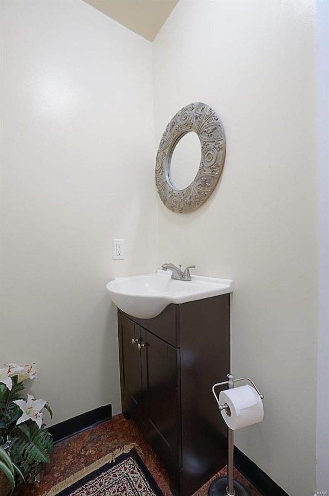 401 Elm St, Washington, MO 63090 - bathroom featuring vanity and baseboards
