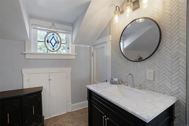 401 Elm St, Washington, MO 63090 - bathroom featuring vanity and vaulted ceiling