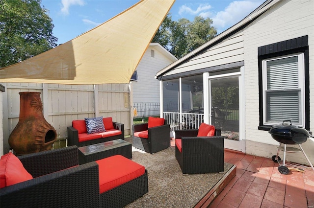 401 Elm St, Washington, MO 63090 - view of patio / terrace with outdoor lounge area, a sunroom, a grill, and fence
