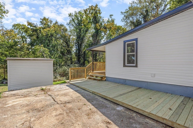 105 N Coffman St, Park Hills, MO 63601 - wooden deck featuring an outbuilding