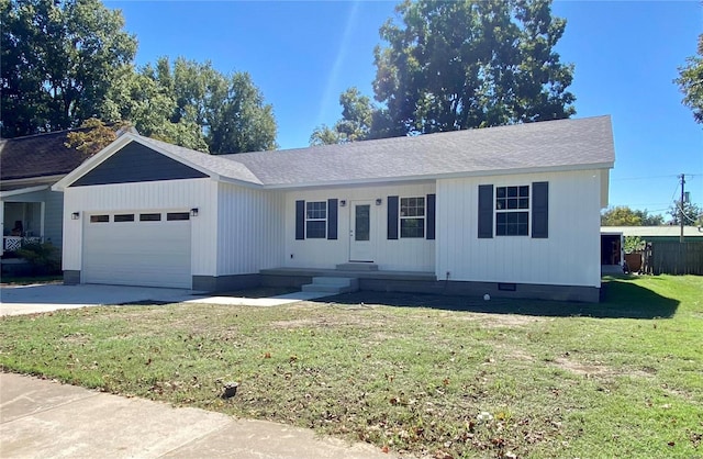 317 E Cypress St, Charleston, MO 63834 - view of front of property featuring a garage, a front yard, concrete driveway, crawl space, and roof with shingles