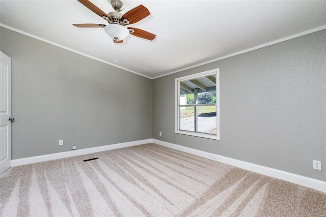273 Vistaview Dr, Villa Ridge, MO 63089 - empty room with carpet floors, a ceiling fan, crown molding, and baseboards