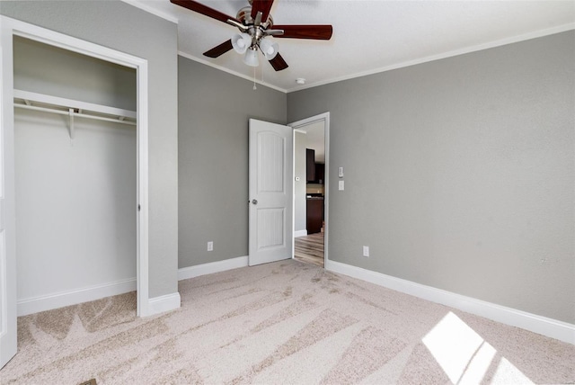 273 Vistaview Dr, Villa Ridge, MO 63089 - unfurnished bedroom with carpet, a closet, crown molding, a ceiling fan, and baseboards
