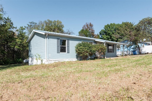 273 Vistaview Dr, Villa Ridge, MO 63089 - manufactured / mobile home with metal roof and a front yard