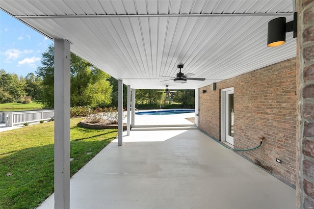 237 Kensington Ln, Cape Girardeau, MO 63701 - view of patio / terrace with a ceiling fan and an outdoor pool