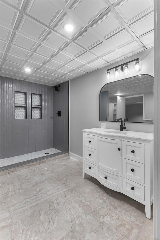 237 Kensington Ln, Cape Girardeau, MO 63701 - full bath featuring vanity, a tile shower, baseboards, an ornate ceiling, and marble finish floors
