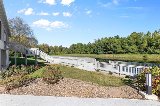 237 Kensington Ln, Cape Girardeau, MO 63701 - view of yard featuring a deck with water view and stairway