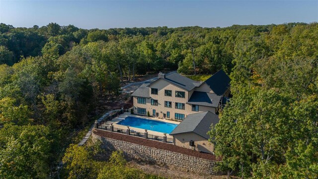2471 Alpine Cove Dr, Innsbrook, MO 63390 - view from above of property featuring a heavily wooded area and a pool area