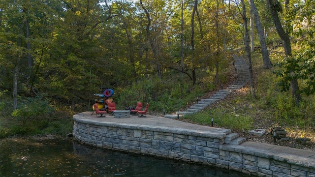 2471 Alpine Cove Dr, Innsbrook, MO 63390 - exterior view of stairs and an outdoor fire pit