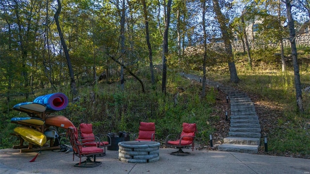 2471 Alpine Cove Dr, Innsbrook, MO 63390 - view of patio / terrace featuring a fire pit and stairs