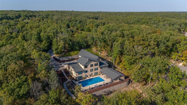 2471 Alpine Cove Dr, Innsbrook, MO 63390 - view of subject property featuring a forest and a pool area