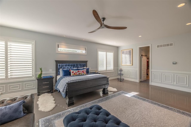 2471 Alpine Cove Dr, Innsbrook, MO 63390 - bedroom with a decorative wall, wainscoting, recessed lighting, and ceiling fan