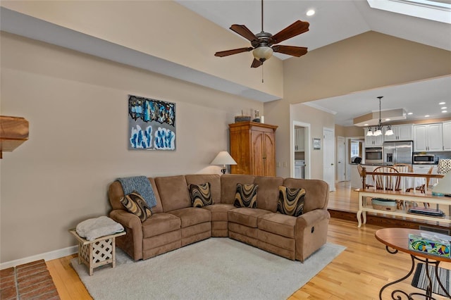 1125 N Franklin St, Litchfield, IL 62056 - living area with a ceiling fan, light wood-style flooring, recessed lighting, a chandelier, and baseboards