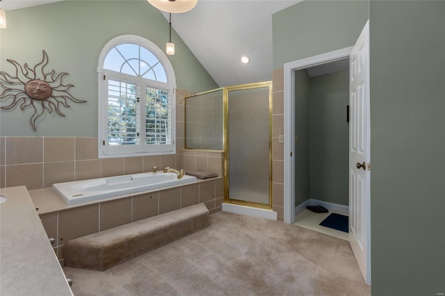 1125 N Franklin St, Litchfield, IL 62056 - bathroom with lofted ceiling, a stall shower, and a bath