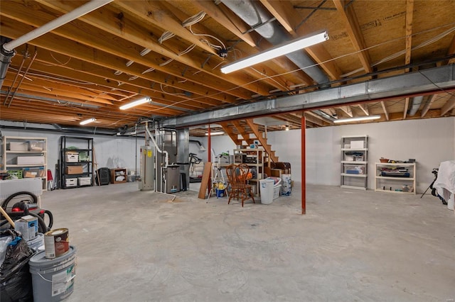 1125 N Franklin St, Litchfield, IL 62056 - unfinished basement with stairs, heating unit, and water heater