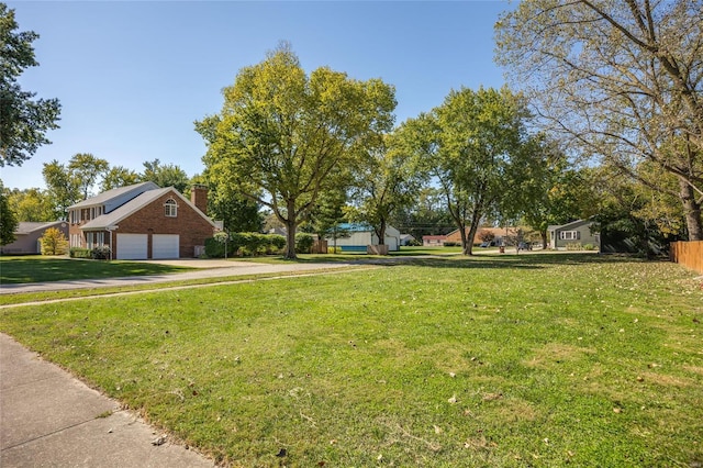1125 N Franklin St, Litchfield, IL 62056 - view of green lawn with concrete driveway