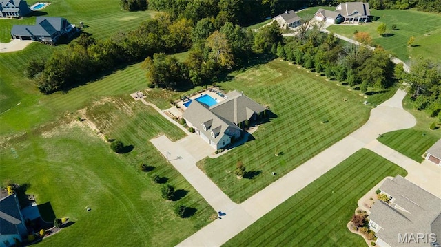 view of property location featuring a pool