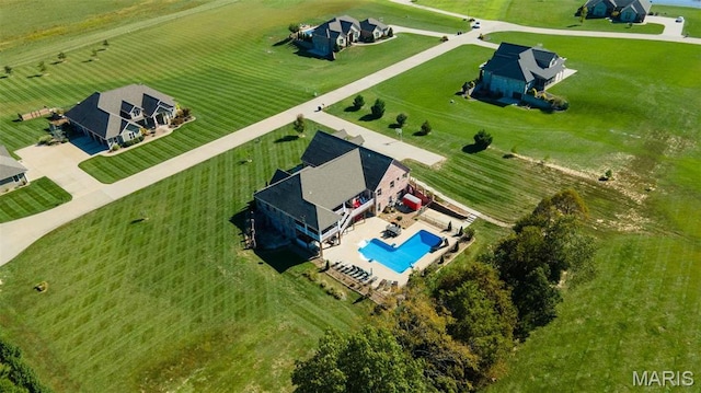 view of rural area featuring a pool