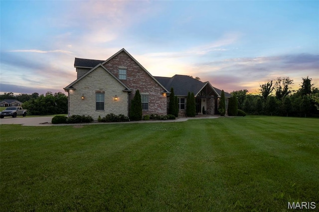 165 Kingsborough Ct, Jackson, MO 63755 - view of front of home with a front yard and stone siding