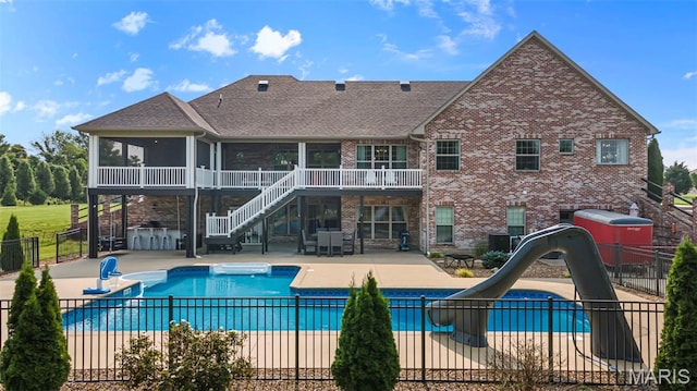 165 Kingsborough Ct, Jackson, MO 63755 - view of pool with a water slide, a patio area, a sunroom, and stairs