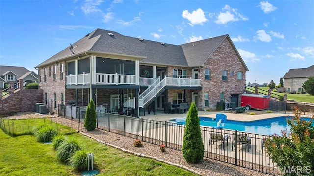 165 Kingsborough Ct, Jackson, MO 63755 - rear view of property with a patio area, a fenced backyard, stairway, and a sunroom