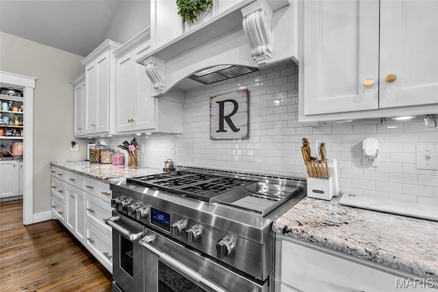 165 Kingsborough Ct, Jackson, MO 63755 - kitchen with range with two ovens, white cabinetry, light stone counters, and tasteful backsplash