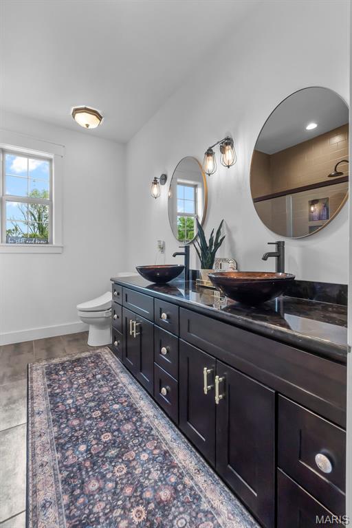 165 Kingsborough Ct, Jackson, MO 63755 - full bathroom with double vanity and plenty of natural light