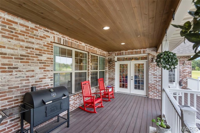 165 Kingsborough Ct, Jackson, MO 63755 - wooden terrace with french doors and exterior kitchen