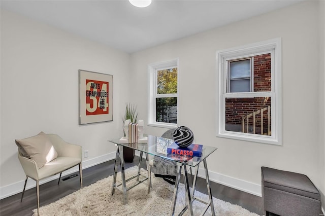 7449 Wayne Ave, Saint Louis, MO 63130 - office area featuring baseboards and dark wood finished floors