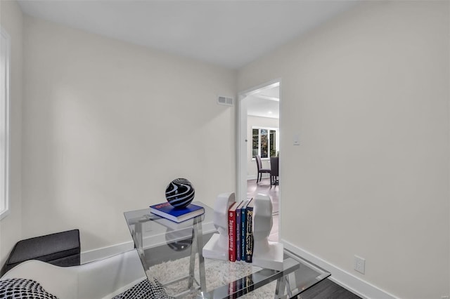 7449 Wayne Ave, Saint Louis, MO 63130 - office with baseboards and wood finished floors