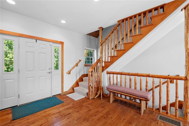 6800 Promise Pt, House Springs, MO 63051 - entrance foyer with recessed lighting, wood finished floors, stairway, and baseboards