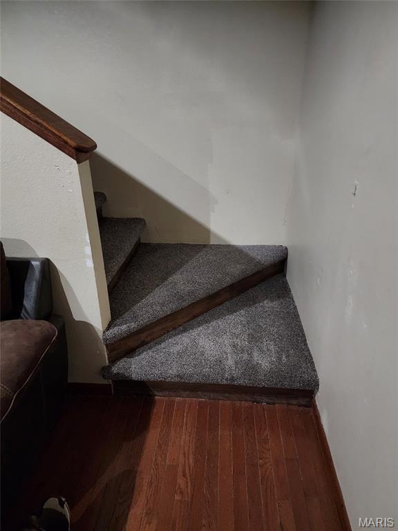 22125 Teak Ln, Saint Robert, MO 65584 - staircase with wood finished floors