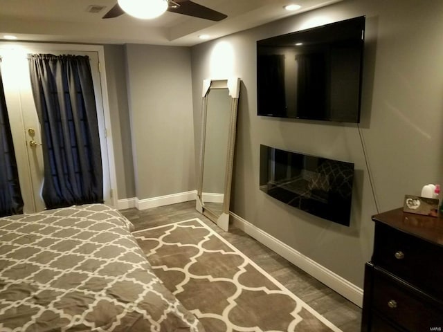 1856 E Broadway, Alton, IL 62002 - bedroom with baseboards, ceiling fan, recessed lighting, and wood finished floors