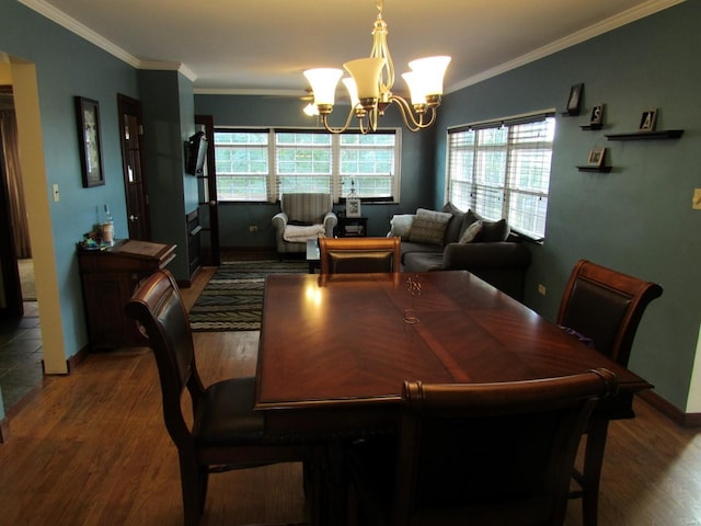 1856 E Broadway, Alton, IL 62002 - dining room featuring a chandelier, wood finished floors, ornamental molding, and baseboards