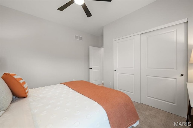 511 Kit Fox Ct, Eureka, MO 63025 - bedroom featuring light carpet, a closet, and a ceiling fan