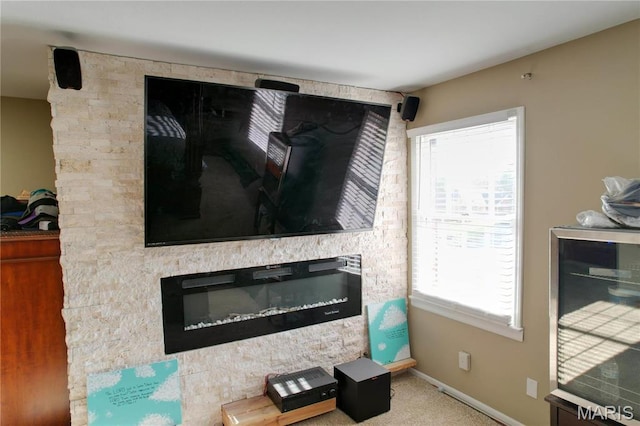 334 Spring Lake Rd, Millstadt, IL 62260 - detailed view of baseboards and a glass covered fireplace
