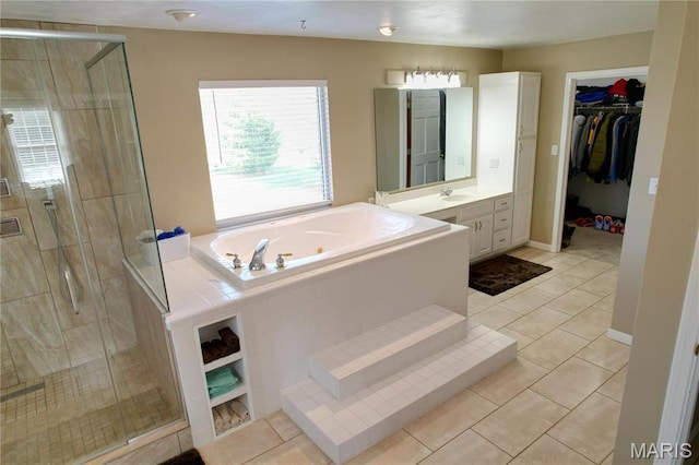 334 Spring Lake Rd, Millstadt, IL 62260 - full bath featuring a shower stall, a tub with jets, vanity, and tile patterned flooring