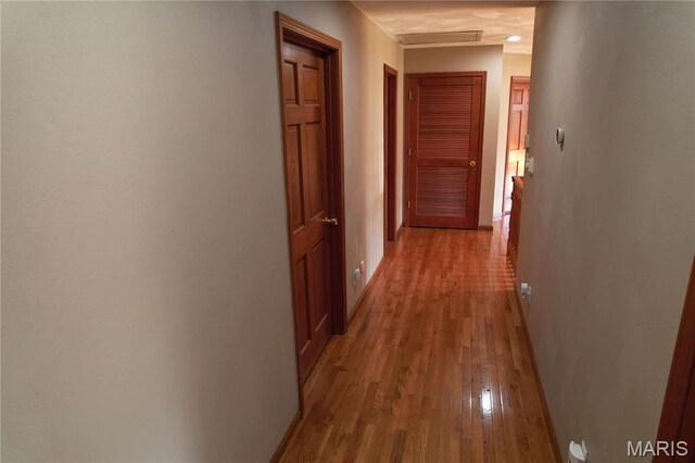 334 Spring Lake Rd, Millstadt, IL 62260 - hall featuring wood finished floors and baseboards