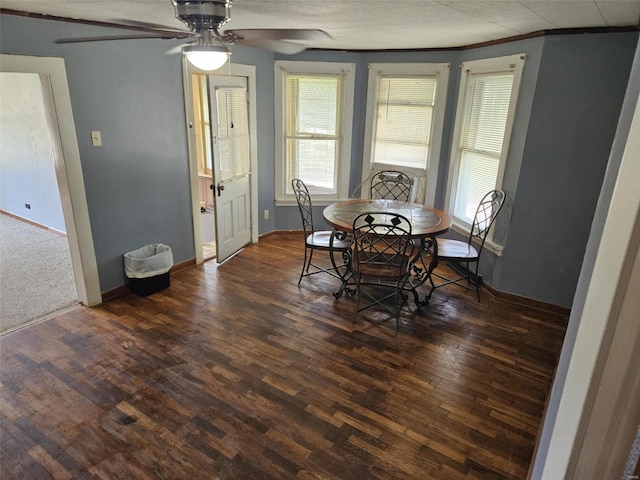 174 Clinton St, Hamburg, IL 62045 - dining space featuring healthy amount of natural light, wood finished floors, baseboards, and crown molding