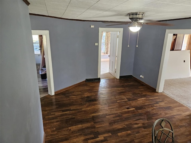 174 Clinton St, Hamburg, IL 62045 - spare room featuring ornamental molding, wood finished floors, baseboards, and ceiling fan