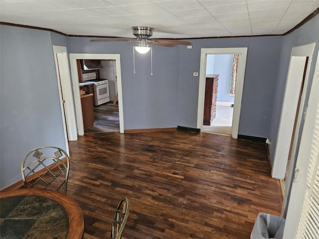 174 Clinton St, Hamburg, IL 62045 - unfurnished dining area with wood finished floors, ornamental molding, ceiling fan, and baseboards