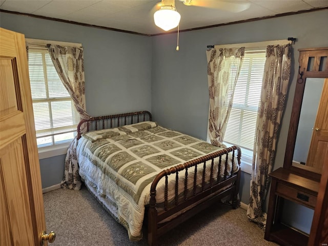 174 Clinton St, Hamburg, IL 62045 - carpeted bedroom featuring crown molding, baseboards, and a ceiling fan